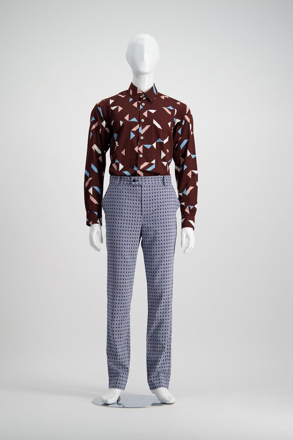 Chocolate Brown shirt with multicoloured pattern, pairedd with tailored pants from WORLD Brand