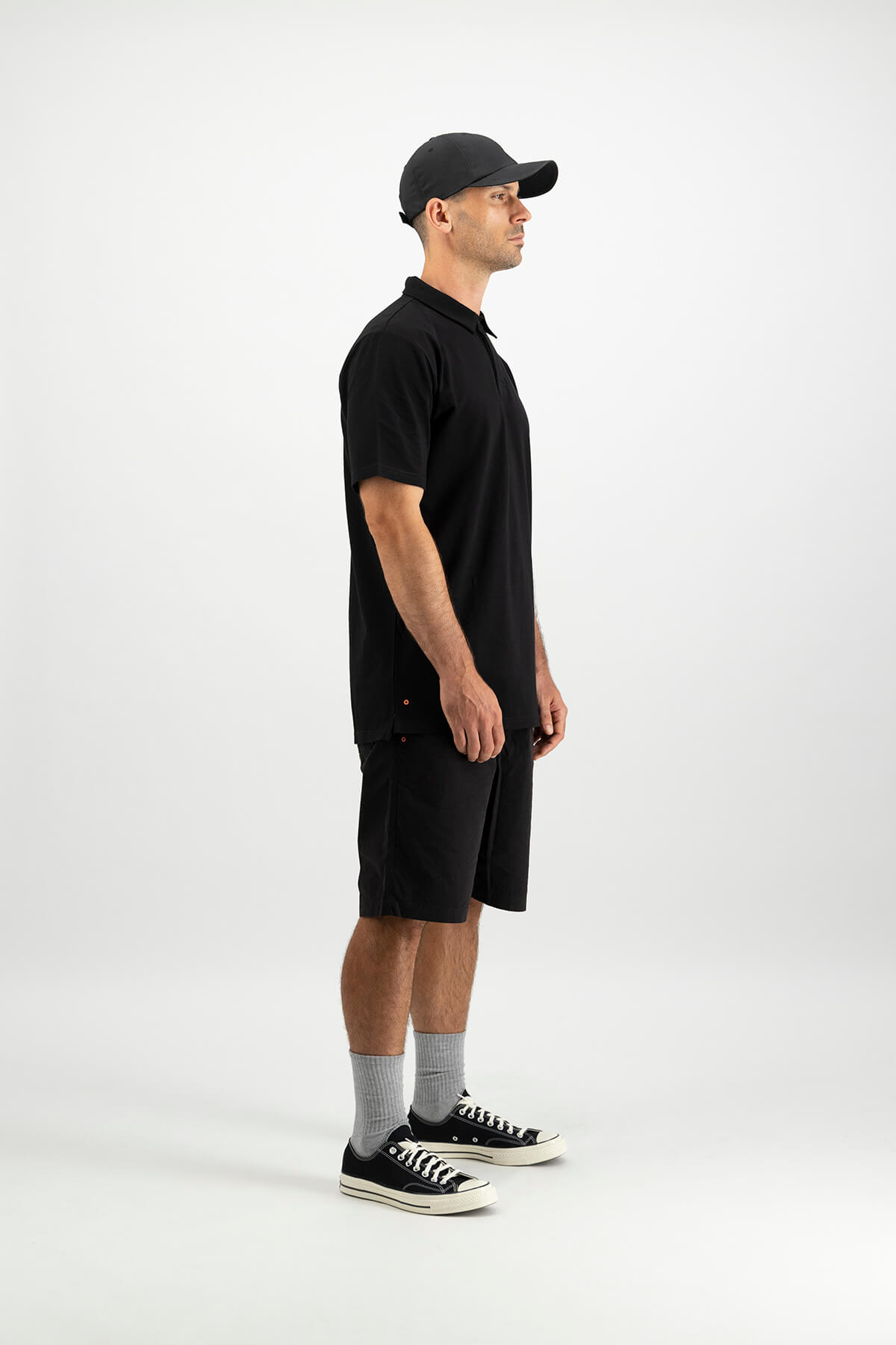 Male model for fantl sport golf wear all black outfit